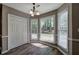 Cozy dining area with large windows overlooking the backyard with a play area at 3186 Sail Winds Nw Dr, Acworth, GA 30101