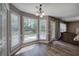 Sunny dining area with backyard view, adjacent to living room with backyard access at 3186 Sail Winds Nw Dr, Acworth, GA 30101