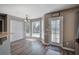 Bright dining area with large windows and door to backyard at 3186 Sail Winds Nw Dr, Acworth, GA 30101
