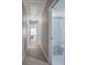 Upstairs hallway with access to bathroom and bedrooms at 3186 Sail Winds Nw Dr, Acworth, GA 30101