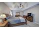 Spacious main bedroom with neutral walls, carpet, a ceiling fan and generous natural light at 3186 Sail Winds Nw Dr, Acworth, GA 30101