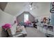 Upstairs playroom or bonus room with vaulted ceilings and ample space at 3186 Sail Winds Nw Dr, Acworth, GA 30101