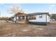 Well-maintained home with a cozy front porch and fresh landscaping enhances its curb appeal at 4605 Doss Cir, Powder Springs, GA 30127
