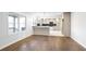 Open floor plan with a combined view of the living room and a modern kitchen at 4605 Doss Cir, Powder Springs, GA 30127