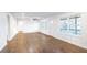 Bright living room featuring hardwood floors, recessed lighting, and multiple windows at 4605 Doss Cir, Powder Springs, GA 30127