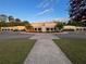 Well-kept building exterior featuring circular design and lush landscaping, creating a welcoming atmosphere at 4790 Epps Ln, Cumming, GA 30040