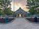 Picturesque park pavilion at sunrise with a well-maintained concrete entrance at 4790 Epps Ln, Cumming, GA 30040