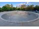 Concrete skate park featuring various ramps and bowls, providing a thrilling space for skateboarders and BMX riders at 4790 Epps Ln, Cumming, GA 30040