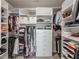 Organized walk-in closet with shelves, drawers, and hanging storage at 4790 Epps Ln, Cumming, GA 30040