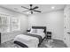 Cozy bedroom with soft lighting, comfortable bed, and stylish decor at 1673 Richland Sw Rd, Atlanta, GA 30311