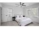Inviting bedroom with lots of natural light, neutral colors, and a ceiling fan at 1673 Richland Sw Rd, Atlanta, GA 30311