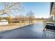 View of the spacious back deck overlooking a large, grassy backyard at 3241 Broadnax Mill Rd, Loganville, GA 30052