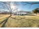 Expansive backyard featuring lush greenery and a charming deck perfect for outdoor enjoyment at 3241 Broadnax Mill Rd, Loganville, GA 30052