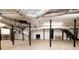 Open basement area features exposed ductwork, concrete flooring, and black support columns at 3241 Broadnax Mill Rd, Loganville, GA 30052