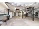Unfinished basement with concrete floor, exposed piping, and a utility sink at 3241 Broadnax Mill Rd, Loganville, GA 30052