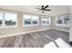 Light-filled bedroom with multiple windows and neutral wall paint at 3241 Broadnax Mill Rd, Loganville, GA 30052