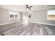 Spacious bedroom with hardwood floors and abundant natural light at 3241 Broadnax Mill Rd, Loganville, GA 30052