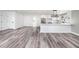 Bright, modern kitchen with stainless steel appliances and elegant white cabinetry at 3241 Broadnax Mill Rd, Loganville, GA 30052
