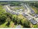 Community aerial showcasing homes, green spaces, and recreational amenities in a well-planned layout at 3525 Brynhurst Dr, Cumming, GA 30028