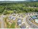 Community aerial showcases the neighborhood's layout with manicured lawns and mature trees at 3525 Brynhurst Dr, Cumming, GA 30028