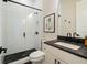 Modern bathroom with a glass-enclosed shower and stylish black fixtures at 3525 Brynhurst Dr, Cumming, GA 30028
