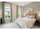 Comfortable bedroom with a decorative accent wall and ample natural light at 3525 Brynhurst Dr, Cumming, GA 30028