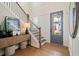 Welcoming foyer with a staircase, stylish decor, and hardwood floors at 3525 Brynhurst Dr, Cumming, GA 30028