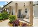 Relaxing covered porch with stylish seating and decorative lighting at 3525 Brynhurst Dr, Cumming, GA 30028