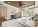 Serene main bedroom with wood ceiling, a seating area, and plenty of natural light at 3525 Brynhurst Dr, Cumming, GA 30028