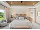 Charming main bedroom with a unique wood ceiling, ceiling fan and large windows at 3525 Brynhurst Dr, Cumming, GA 30028