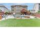 Expansive backyard with a sparkling pool, lush green turf, and a spacious deck perfect for outdoor living at 3939 Soft Wind Ter, Buford, GA 30518