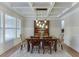 Bright dining room with coffered ceilings and stylish pendant lighting, perfect for entertaining at 3939 Soft Wind Ter, Buford, GA 30518