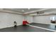 Home fitness room with mirrored wall and dance floor, providing plenty of space to workout at 3939 Soft Wind Ter, Buford, GA 30518