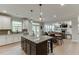 Beautiful kitchen with granite countertops, stainless steel appliances, and white cabinets at 3939 Soft Wind Ter, Buford, GA 30518