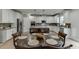 The spacious kitchen features stainless steel appliances, a large island, and granite counters at 3939 Soft Wind Ter, Buford, GA 30518