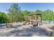 Community playground with a slide, swings, and climbing structure for residents to enjoy at 3939 Soft Wind Ter, Buford, GA 30518