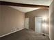 Bedroom with carpet flooring, a window with blinds, neutral wall tones, and a lamp at 5846 Par Four Ct, Lithonia, GA 30038