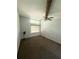 Spacious bedroom featuring a vaulted ceiling, carpet floors, and natural light at 5846 Par Four Ct, Lithonia, GA 30038