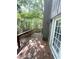 Spacious deck with wooded view, ideal for enjoying nature and outdoor relaxation at 5846 Par Four Ct, Lithonia, GA 30038