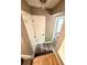 Carpeted steps to hallway and kitchen at 5846 Par Four Ct, Lithonia, GA 30038