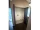 A utility or laundry room with open door and connections for machines at 5846 Par Four Ct, Lithonia, GA 30038
