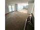 Spacious living area with French doors and a fireplace at 5846 Par Four Ct, Lithonia, GA 30038