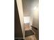 Carpeted stairs lead to a window and landing above at 5846 Par Four Ct, Lithonia, GA 30038