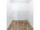 Walk-in closet featuring wire shelving and neutral carpet at 1451 Brays Mill Trce, Lawrenceville, GA 30044