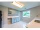 Kitchen features a large window and ample counter space at 1451 Brays Mill Trce, Lawrenceville, GA 30044