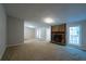 Spacious living room with fireplace and large windows at 1451 Brays Mill Trce, Lawrenceville, GA 30044