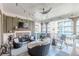 Inviting covered balcony with fireplace, outdoor kitchen, and cozy chairs at 976 Memorial Se Walk, Atlanta, GA 30316