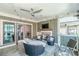 Expansive outdoor living area with an outdoor kitchen, fireplace, and comfortable seating at 976 Memorial Se Walk, Atlanta, GA 30316
