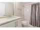 Bright bathroom with a white subway-tile shower and marble-topped vanity at 976 Memorial Se Walk, Atlanta, GA 30316