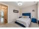 This modern bedroom features a plush blue bed frame and stylish gray bedding at 976 Memorial Se Walk, Atlanta, GA 30316